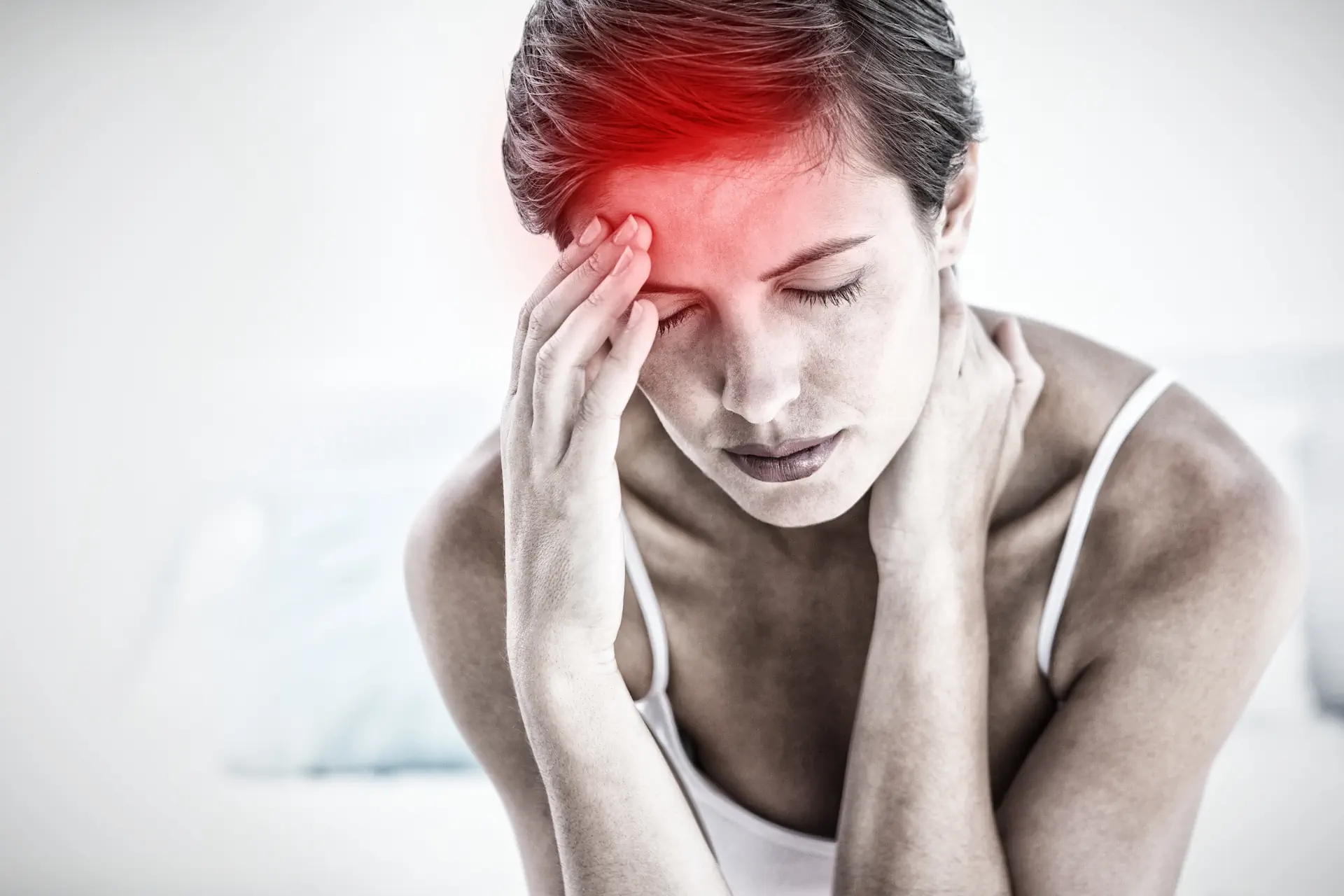 Woman suffering from migraine
